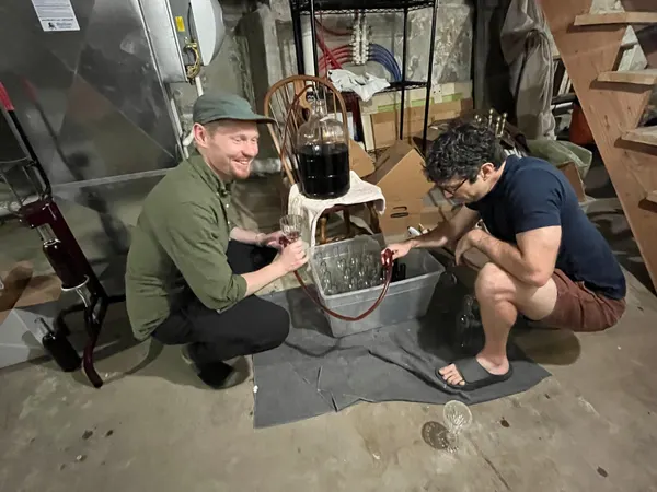Bottling Avis DeChaunac in his basement